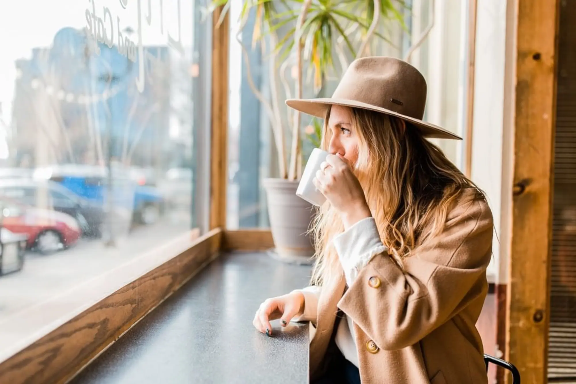 Female Model Coffee Enliten window